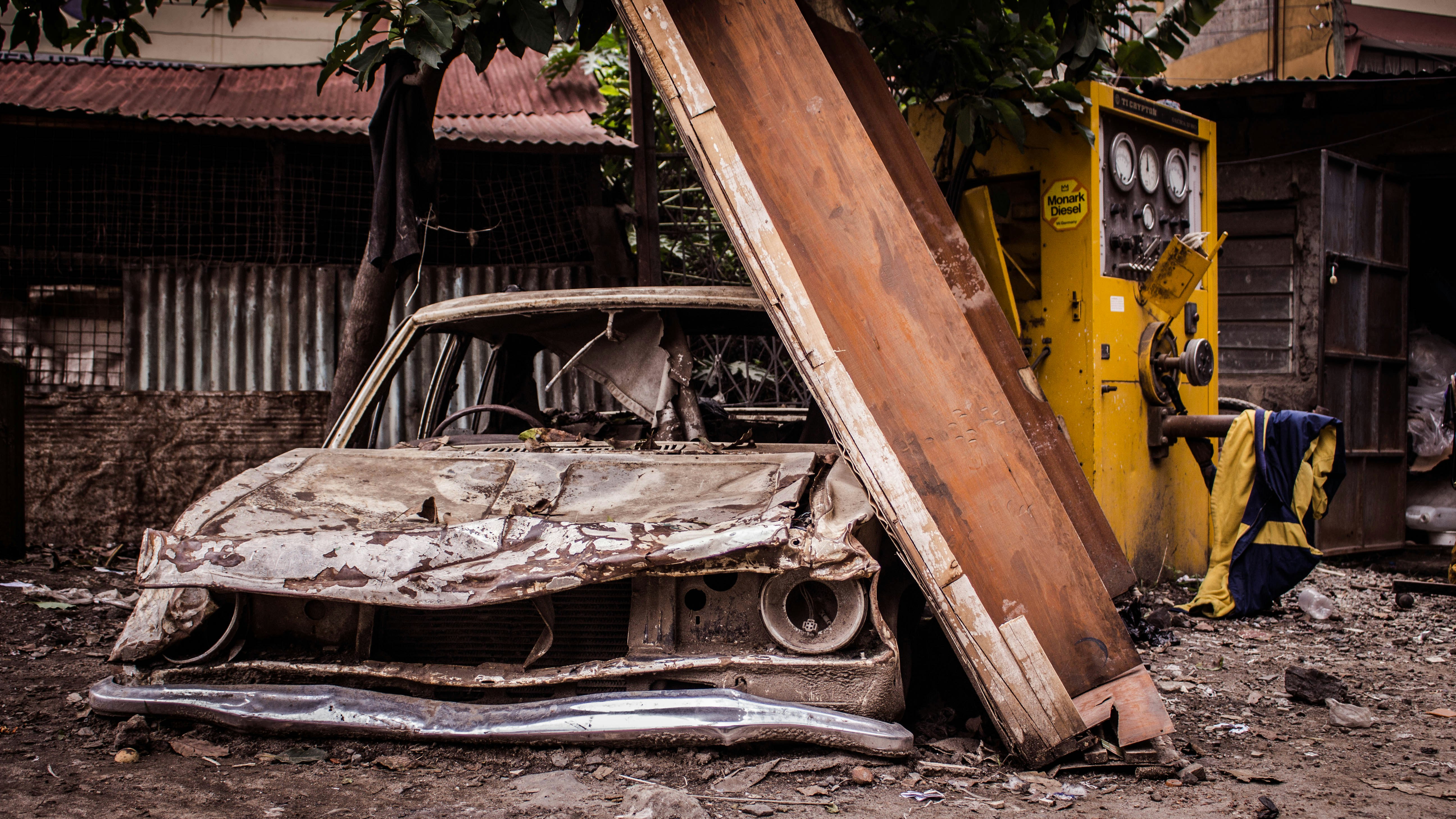 wrecked brown car